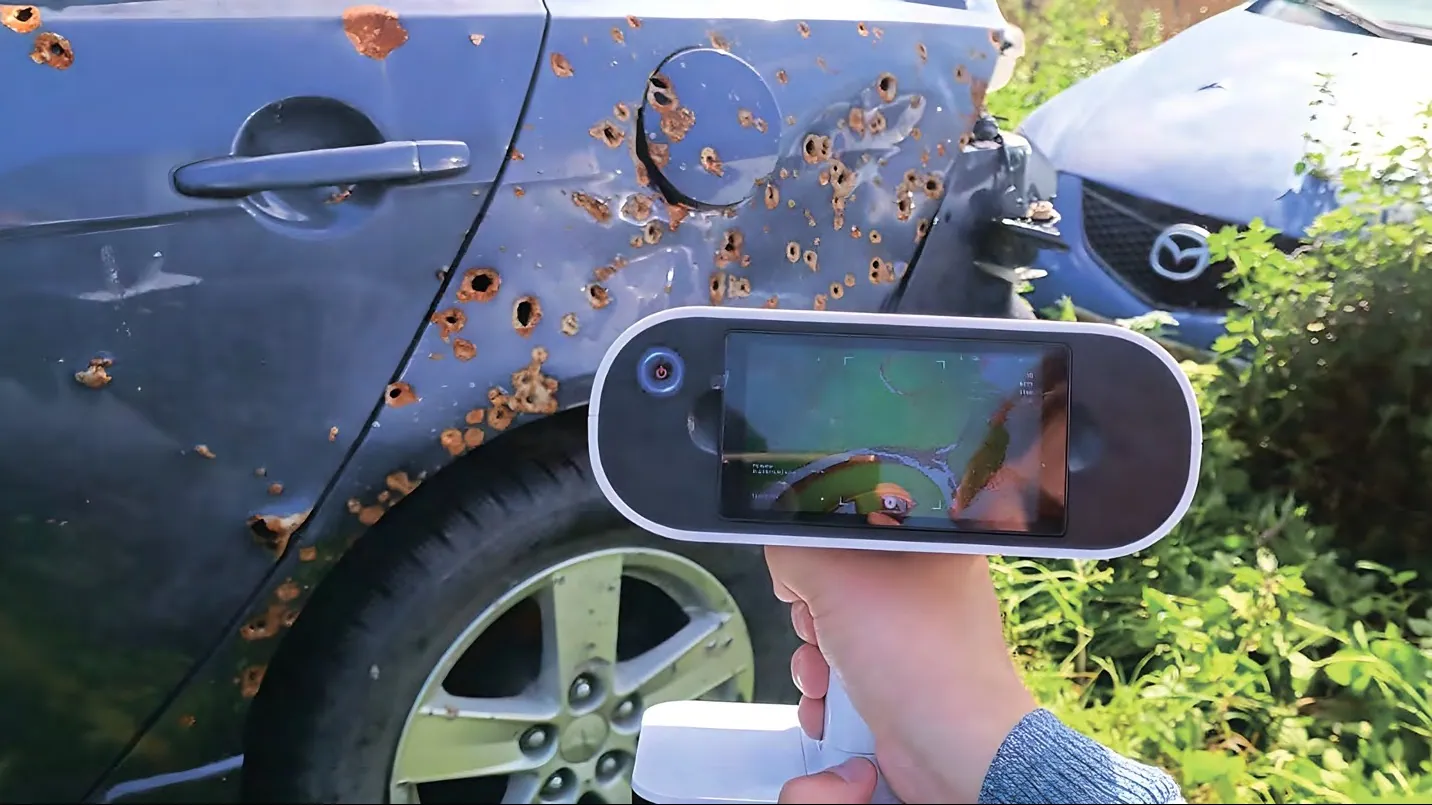 Artec Leo 3D scanner capturing bullet damage on a vehicle at a shooting scene